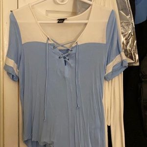 blue and white cross shirt